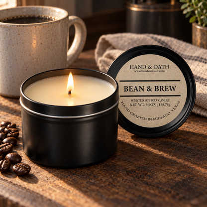 Bean & Brew soy candle in a black tin, styled in a home setting